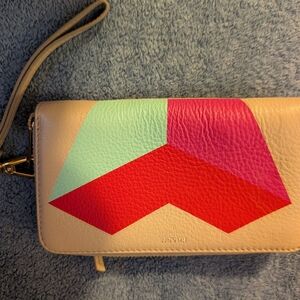 Fossil leather wallet and wristlet.
